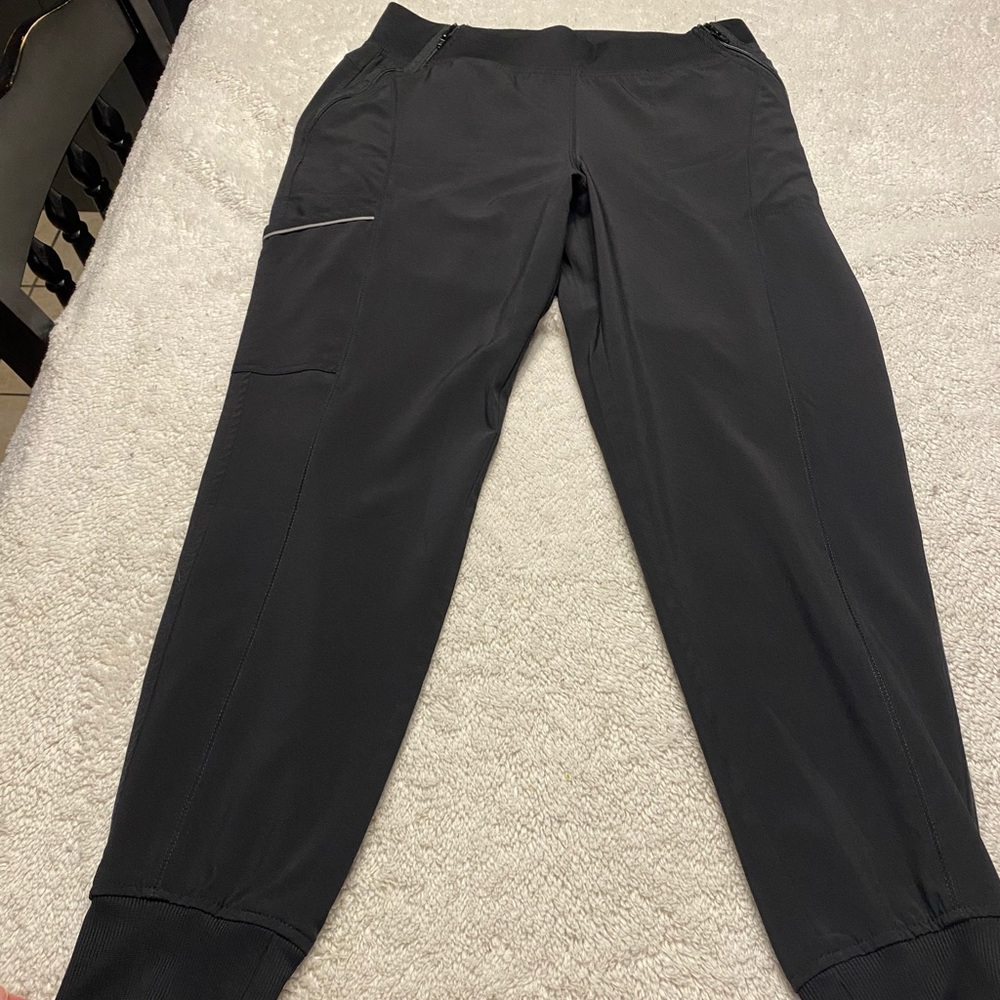 Cherokee Infiniti joggers. Color is black. Size is medium. Flattering side zips
